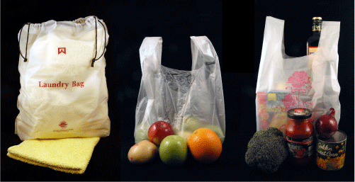 three polythene bags containing shopping